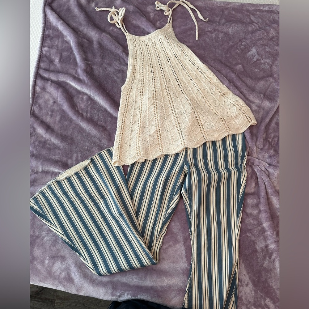 Knitted crop top and bell bottom jeans